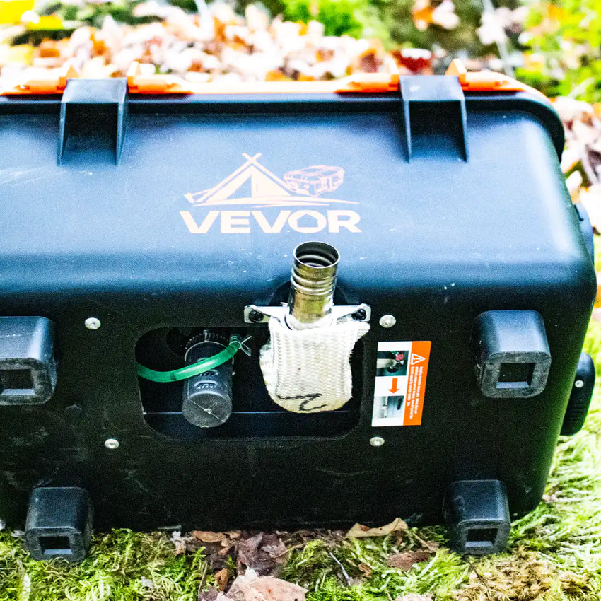 Visto da sotto del riscaldatore a gasolio con tubo di scarico laterale che si avita e del entrata d'aria con protezione