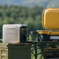 Power Station portatile in uso in campeggio accanto ad una griglia